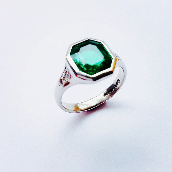 Large Emerald Octagon set platinum signet style ring with brc diamonds pave set shoulders bespoke commission - David Smith Jewellery 